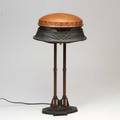 Secessionist helmetshaped table lamp germanaustrian c1900 patinated brass copper painted metal unmarked 22 x 11 34