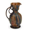 George ohr 1857  1918 fine and tall pitcher with ribbon handle blue raspberry and ochre mottled glaze biloxi ms 18971900 stamped g e ohr biloxi miss 7 12 x 5