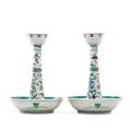 Pair of chinese porcelain candlesticks 20th c one with repair chenghua marks 9 38