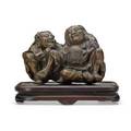 Japanese bronze okimono two seated figures on a wood pedestal early 20th c 3 x 4 x 2 12