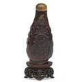 Chinese amber snuff bottle dragon decoration in relief with lid and base 19th c 3 34with base