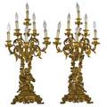 Pair of french bronze candelabra 6arm with seated cherubs at base mounted as lamps late 19thearly 20th c 30 x 9 x 6 fixture