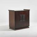 James mont  stromberg carlson stereo cabinet in stained and lacquered mahogany finish with chinesemotif embossed panels fitted with stromberg carlson stereo stromberg carlson metal tag 35 x 39