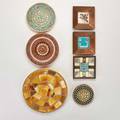 Mosaic and copper tableware seven pieces usajapan 20th c  most mounted on patinated metal backings some marked including mosaic art center lake wales fl desert house crafts tucson az