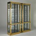 Mastercraft pair of illuminated vitrines usa 1980s brass glass antiqued mirror and lacquered wood metal labels each 84 12 x 33 12 x 16
