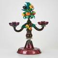 Murano twopiece candelabrum with applied fruit and leaves together with second some elements missing italy 20th c colored glass unmarked 17 x 13 x 8