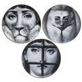 Piero fornasetti 1913  1988 eight transferdecorated porcelain plates four in original boxes italygermany six from the tema e variazioni series two from the lhomme dans lespaceparis mat