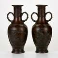 Pair of chinese bronze vases twohandled decorated with birds on branch 20th c unmarked each 14 12 x 6