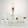 Glass group fifteen pieces including oil lamp lamp founts sugar caster pressed glass etc 20th c caster marked tallest 15 12