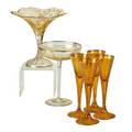 Etched and gilded glass group seventyseven pieces europe 19th  20th c including six ruby flash flutes a set of amber glass flutes a set of decanters twelve water glasses and mixed saucers b