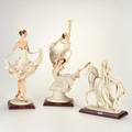 Giuseppe armani three porcelain figurines ballerinas woman riding a horse and woman in dcollet gown original brass name plates on wood bases florence italy 1988 signed and dated tallest 2