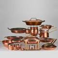 Copper kitchenware twentytwo pieces including joseph heinrichs covered chafing dish lined in sterling silver bainmarie colander pitchers saucepans etc earlymid20th c copper sterling sil