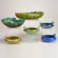 Fulper six pieces flemington nj ca 19161928 four twohandled bowls leafshaped bowl with builtin flower frog and twohandled tray glazed earthenware five racetrack marks one diestamped