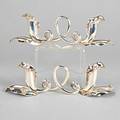 Pair of italian 800 silver candle stands lily and vine form support two lights each maker 77 mi milan mid 20th c 156 ot 10 34