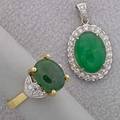 Jade and diamond jewelry late 20th c oval cabochon 125 x 102 mm centers 14k yg ring with wg and diamond shoulders size 7 34 oval cabochon 168 x 121 mm framed by diamonds in 18k wg pen