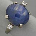 14k gold star sapphire and diamond ring ca 1960 oval blue sapphire 1425 x 125 x 75 mm approx 12 cts diamonds approx 20 ct tw in 14k wg 37 dwt size 5 12