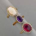 Three jeweled diamond oval cluster rings 20th c opal amethyst synthetic ruby all 14k yg diamonds approx75 ct tw 94 dwt size 5 12  8 12