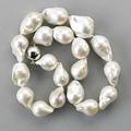 Strand of large baroque south sea white pearls nineteen pearls 28  20 mm 18 on magnetic ball clasp