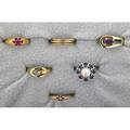 Eight gold rings 14k wg with sapphire and pearl 14k yg with amethyst 14k yg with ruby with interior inscription lula to herbert 1898 three 14k yg bands 14k yg modern design 10k yg flo