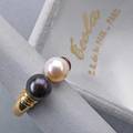 Cecla paris 18k yellow gold bicolor pearl ring confronted black and white cultured pearls 76 mm remnants of partial patination in original box french marks 47 dwt size 4