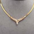 14k yellow gold diamond necklace ca 1980 a chevronshaped panel centers a bright circular cut diamond approx 50 ct with smaller diamonds approx 12 cts tw on curb link chain 115 dwt 16