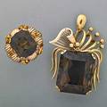 Austrian 14k gold smokey quartz jewelry ca 1954 hand built volute and ribbon motif pendant with a scissorcut quartz 25 x 215 mm similar quartz ring 15 x 135 mm size 7 12