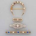 Art deco gold brooches and pin 14k gold crescent brooch with river pearls and diamonds on platinumtopped leaves platinumtopped bar pin with sapphire and diamonds 10k wg filigree pin with diamond