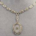 Art deco 10k white gold filgree necklace oval frosted crystal panel star cut and diamondset drops as lavaliere from filigree links 101 dwt 158 gs drops 214 length 16