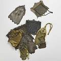 Nine mesh handbags 18951960 includes gilt or jeweled metal gunmetal brass two have integral mirrors losses and wear noted