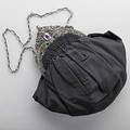 Continental jeweled silver evening bag ca 1910 pierced frame with pastel tone prong set jewels pierced and chiseled rococo reverse ruched black satin sack with envelopeshaped change purse unma