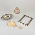 Stieff sterling vanity items in baltimore rose six items 19th20th c round covered canister monogrammed 4 oval open tray 8 14 picture frame 9 x 7 hand mirror 10 169 ot excludes
