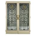 Set of smoked glass mirrored doors wrought iron grilles with brass archers in top central medallions 20th c 84 x 31 12