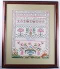 Alphabet Needlepoint in Mahogany Frame