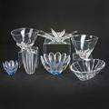 Orrefors steuben and baccarat seven glass pieces 20th c including starfish shaped centerpiece two orrefors lobed bowls two steuben bowls etc all marked tallest 8 14