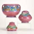 Roseville three pink baneda jardiniere and two bulbous vases one marked largest 7 x 10 12 dia