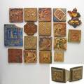 Batchelder moravian tile works nineteen tiles 1900s six batchelder tiles including two brass mounted as bookends most impressed batchelder los angles thirteen assorted mta tiles marked doyles