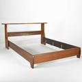 Paul strum sculpted walnut queensized headboard and bed frame 1969 incised signature and date 37 x 75 12 x 92