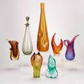 Rossini murano etc six vases in various colors shapes and sizes together with a decanter italy two marked largest 20 14