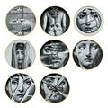 Piero fornasetti rosenthal eight transferdecorated porcelain hanging plates tema e variazioni line italygermany all marked with rosenthal germany fornasetti decor temi e variazioni 9 14 di