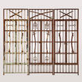 Architectural salvage three large functional window gates decorated with antique swords scabbards stirrups and bits 20th c wrought iron unmarked each 106 x 39 12
