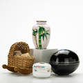 Decorative group four pieces asian cloisonne lidded egg and bamboodecorated vase nippon hair receiver and wicker cradle with baby figurines porcelain fabric egg 4 12 x 4 x 6 12