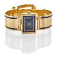 Gucci enameled 18k gold buckle bracelet watch rectangular watch 18 x 25 mm swiss 17 jeweled movement dark blue dial with dash hour markers on conforming strap inlaid with blue enameling adjuste