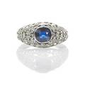 Edwardian sapphire and diamond platinum ring handbuilt reticulated platinum centrally set with cushion cut sapphire approx 89 ct diamond melee approx 45 ct ca 1910 unmarked size 6 26