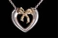 Tiffany  Co SS 18KYG Heart Bow Necklace