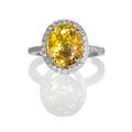 Golden yellow sapphire and diamond 14k wg ring oval faceted sapphire 114 x 86 mm 745 cts and diamond thread halo and half hoop 44 ct tw size 7 37 dwt