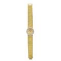 Piaget ladies 18k gold diamond watch circular gold face with arrow hands 25 mm diamond bezel flexible textured strap quartz movement stem on back of case ca 1980 6 12 tapers 469 dwt gw