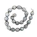 Dark grey tahitian baroque pearl diamond necklace twentyone lustrous saltwater pearls 222  158 mm join spherical diamond pave 18k wg clasp approx 150 cts tw 17 12 942 dwt gw