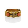 Archaeological revival coral 18k gold bracelet 15k bloomed gold hinged geometric bangle with concentric rows of precise wirework centrally decorated with two coral buttons 122 mm bright and gran