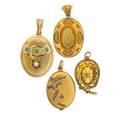Four victorian or art nouveau yellow gold lockets includes victorian buckle motif with oec diamond accent horseshoe motif oval cannetille and art nouveau bloomed gold slide locket on chain 1418k