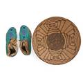 Pair of plains indian beaded moccasins together with a pomo basket with geometric designs first half of 20th c larger 14 12